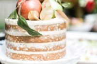 08 a naked wedding cake topped with apples is all you need for a Scandinavian fall wedding