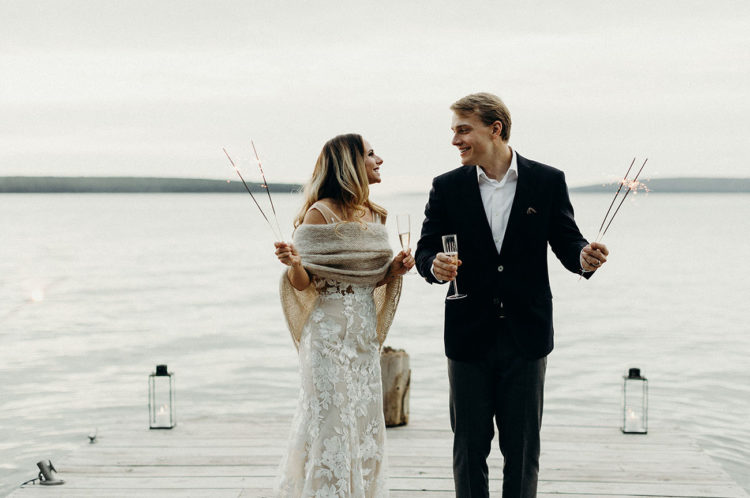 The bride covered up with a knit shawl and they went to the lake to enjoy the views and have some champagne