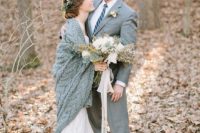 09 a grey suit for the groom and a grey knit coverup for the bride is a chic idea for a winter wedding and for couple’s portraits