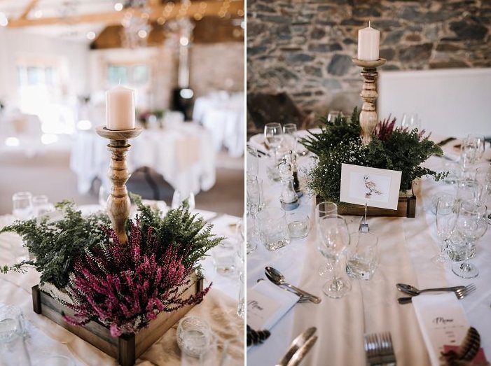The wedding centerpieces were made of dried blooms and greenery plus candles