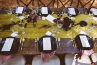 10 The wedding tablescapes were done with jewel-tone linens, black chargers and plates