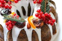 10 a poppy seed citrus bundt wedding cake topped with candied fruit, berries, citrus and cinnamon for a Christmas wedding