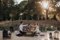 12 The couple enjoyed a sunlit picnic together surrounded with lanterns and cacti