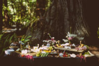 12 The couple styled a cool cheese and fruit table decorated with moody florals
