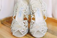 12 silver rhinestone leafy high heels will add a glam yet natural touch to your bridal look