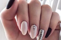 16 glossy white, matte black nails, an accent with rhinestones and silver glitter for a holiday wedding