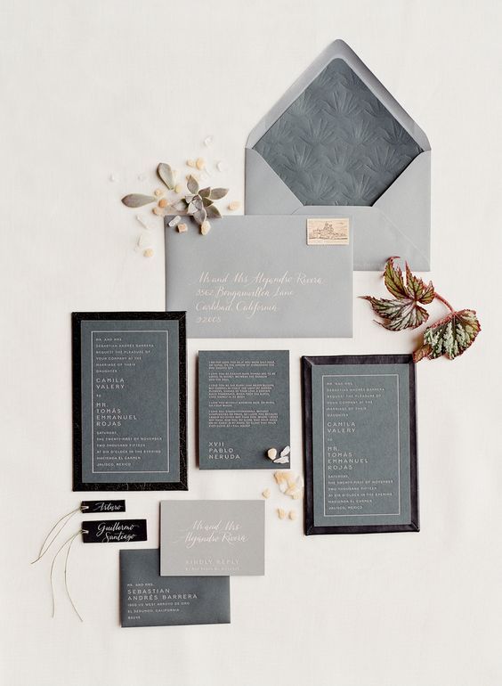 a grey winter wedding invitations suite with touches of black and letter pressing for a modern feel