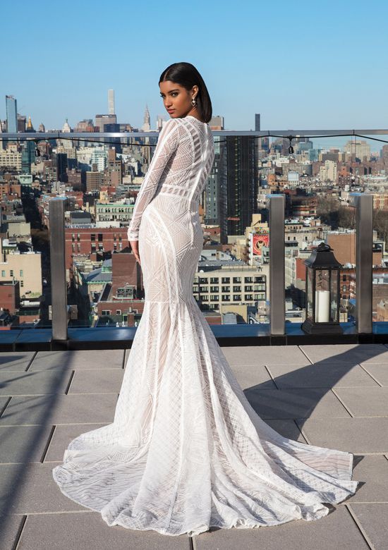 a mermaid geometric lace wedding gown with a high neckline, long sleeves and a train