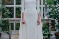 18 a plain fitting wedding dress with a high neckline and creative long sleeves for a modenr or minimalist bride