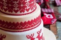 19 a Scandinavian red and white winter wedding cake imitating patterns on traditional sweaters is super cute