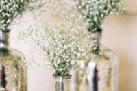 19 fill mercury vases with baby’s breath or other white flowers to add height and texture to tables
