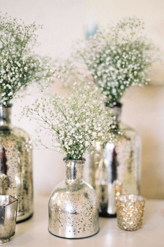 fill mercury vases with baby’s breath or other white flowers to add height and texture to tables