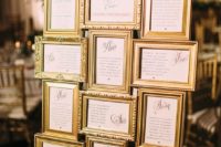20 a refined seating plan with picture frames from thrift stores that were spray painted gold, such a cool idea