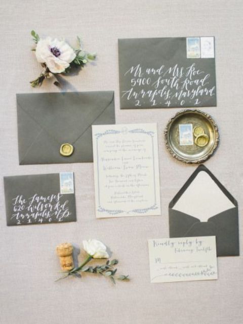 grey wedding stationery with whites and calligraphy plus touches of gold is a timelss idea for winter