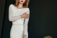 22 a sexy mermaid geometric lace wedding gown with long sleeves, a bateau neckline and a highlighted waist