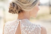 22 a simple boho wedding hairstyle with a braided low bun and twists is a timeless solution for a Scandinavian bride