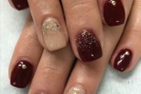 23 burgundy nails with rhinestones and beige nails with glitter for a bright festive manicure
