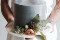 25 a matte grey cake with fresh greenery and blooms is a cool idea for a modern winter wedding in grey
