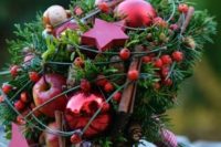 28 a unique Christmas wedding bouquet of evergreens, red apples, ornaments, nuts and holly berries