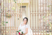 03 It was an amazing off the shoulder wedding dress with a lace bodice, a full skirt and she was wearign a veil