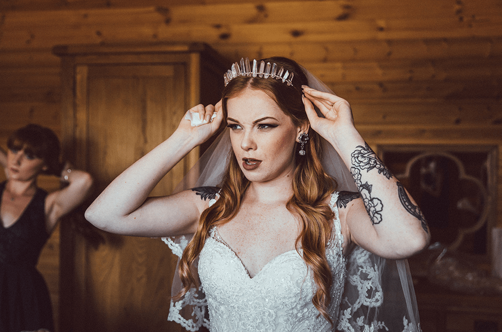 She was wearing a handmade crystal crown and a veil with a lace trim