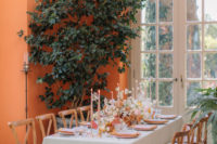 06 The reception took place in an orangery, the color palette was done of orange, pink and mint tones