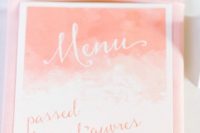 06 a watercolor ombre coral wedding menu with calligraphy is a bold and trendy idea with its color and design