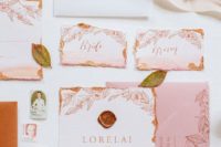 07 a beautiful and delicate wedding invitation suite done in peahcy pink and with copper leaf touches