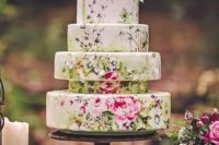07 a creative hand painted wedding cake done of different tiers to make it catchy and even whimsy