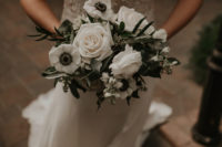 08 The wedding bouquets were made of pale greenery and white anemones and roses