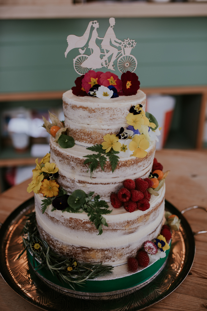 The wedding cake was a naked one, with severla different layers, fresh fruits and berries