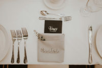 11 The place settings were styled in grey, black and white, with fresh eucalyptus