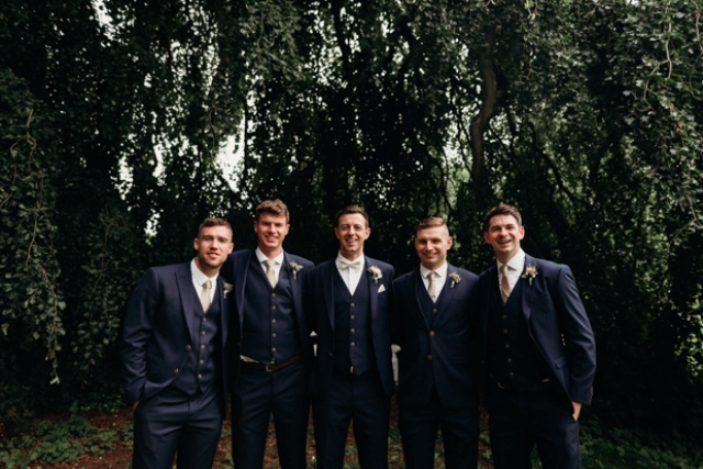 The groomsmen were wearign the same as the groom but with usual ties