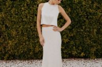12 a modern bridal separate with a lace pencil skirt and a plain high neck top with no sleeves