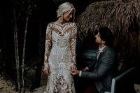 12 a super romantic boho lace wedding gown with a train and long sleeves
