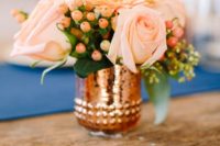 gorgeous floral arrangement in a copper vase