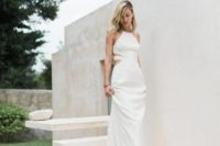 15 a plain halter neckline wedding gown with side cutouts is a chic idea to combine two different trends