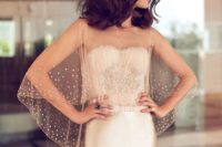 22 a sheer champagne-colored wedding cape with beading looks very refined and sparkling