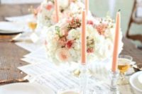 22 a sweet vintage-inspired wedding tablescape with note paper, peachy candles and blooms, copper cutlery and white plates