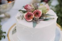 cute buttercream wedding cake with figs