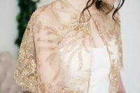 24 an embellished and embroidered wedding capelet in gold will add color to your space