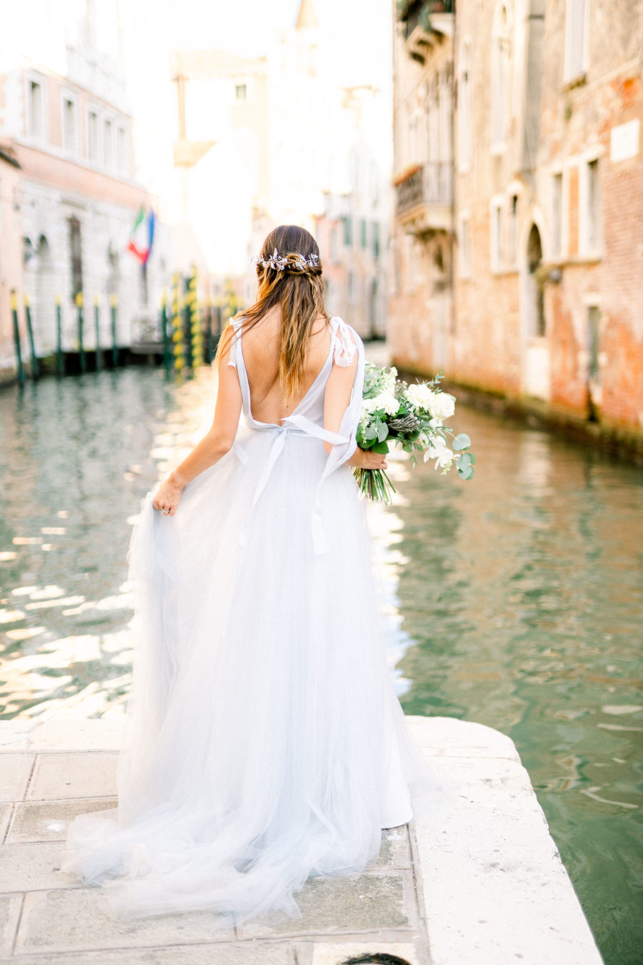 This wedding shoot took place in Venice and was done with a subtle and tender color palette unlike usual Venice weddings in jewel tones