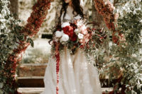 bride in a gorgeous lace wedding dress with a train