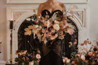 02 The bride was wearing a strapless black and blush midi gown with a high low skirt
