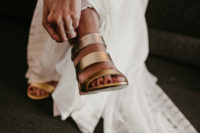 She added stylish metallic mules to accent her look