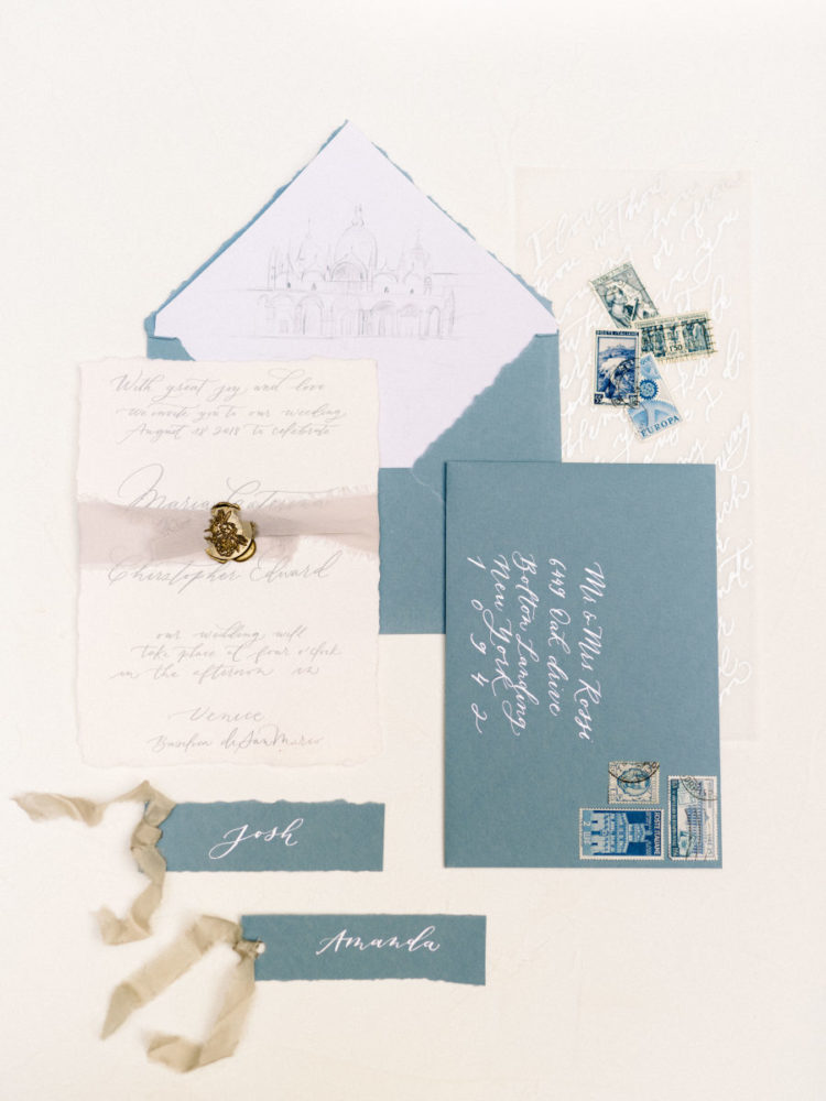 The wedding stationery suite was done in blues and dove greys with refiend detailing