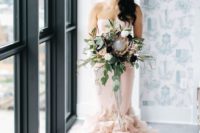 06 a gorgeous blush mermaid strapless wedding dress with a ruffled tail