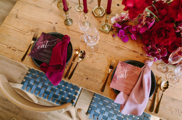 Colorful candles and pink and plum stationery and napkins finished off the table setting