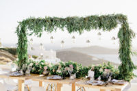 gorgeous wedding backdrop with hanging decorations