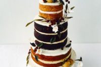 08 a vegan gluten-free naked wedding cake topped with white blooms, greenery and pears